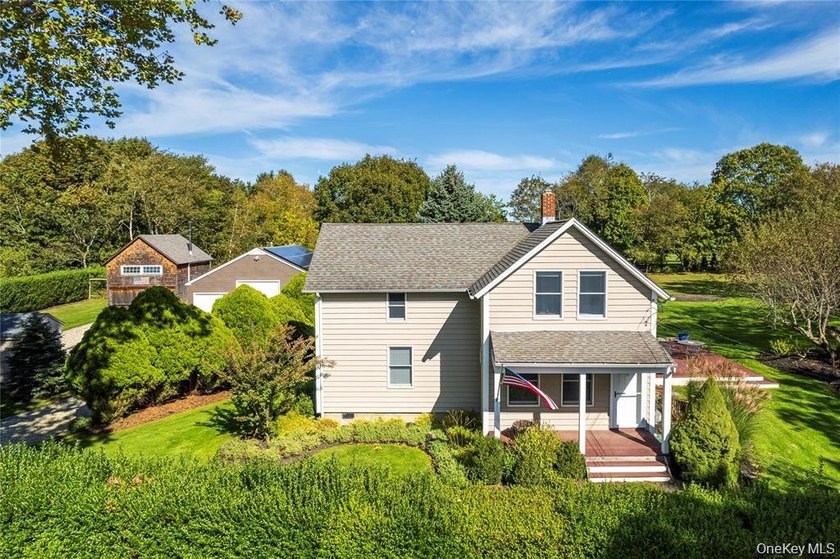 Set on 1.16 acres of beautifully landscaped and private grounds - Beach Home for sale in Cutchogue, New York on Beachhouse.com