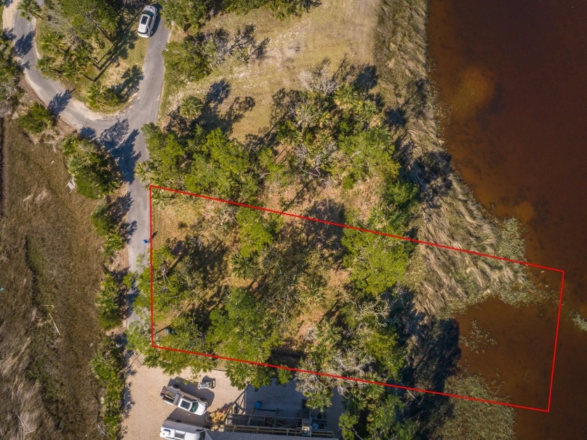 Bring your golf cart.  Looking for a cleared lot with canal - Beach Lot for sale in Shell Point, Florida on Beachhouse.com