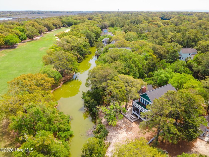 Tucked beneath a canopy of mature maritime forest and - Beach Home for sale in Bald Head Island, North Carolina on Beachhouse.com