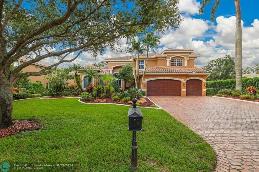 Impeccably maintained home in sought after gated Long Lake - Beach Home for sale in Davie, Florida on Beachhouse.com