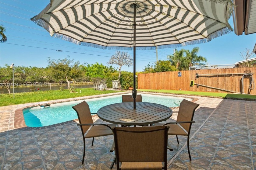 Welcome to the sought-after community of Pasadena Lakes West, a - Beach Home for sale in Pembroke Pines, Florida on Beachhouse.com