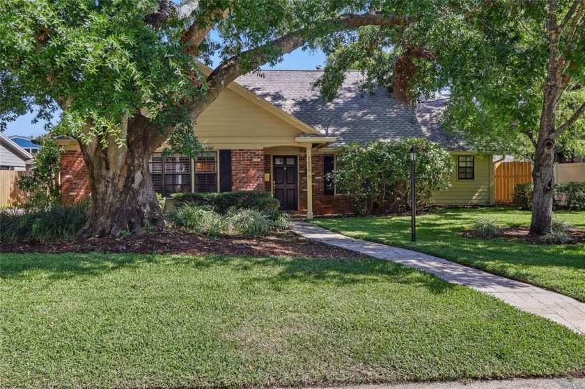 Welcome to your dream home in Old Carrollwood, located on a - Beach Home for sale in Tampa, Florida on Beachhouse.com