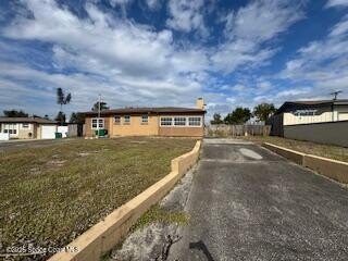 NO HOA, Pool Home with large yard . Near shopping, schools - Beach Home for sale in Cocoa, Florida on Beachhouse.com