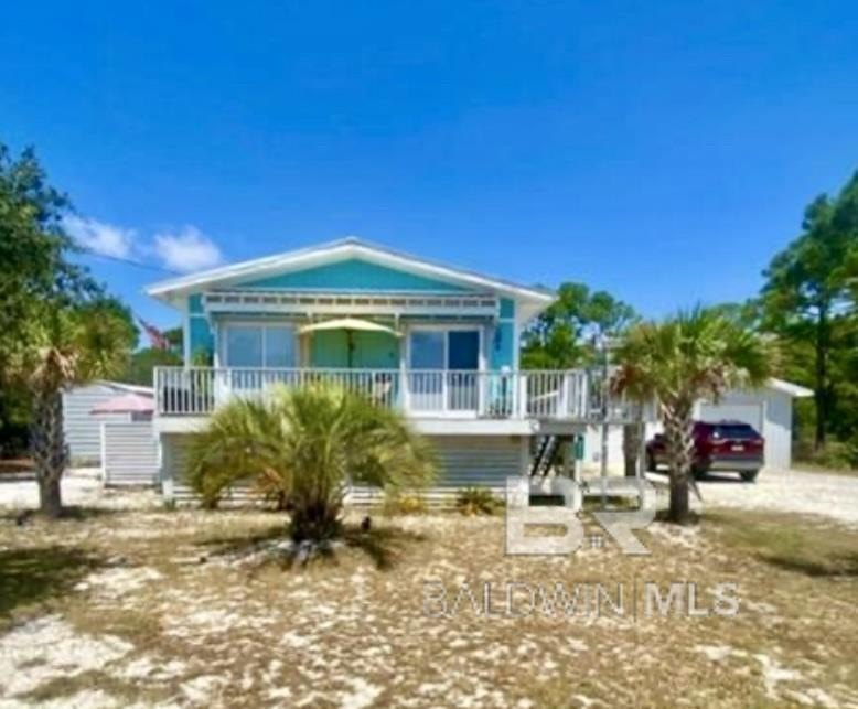 INCOME POTENTIAL!! A BEAUTIFUL 2BED/2BATH with outside living - Beach Home for sale in Gulf Shores, Alabama on Beachhouse.com