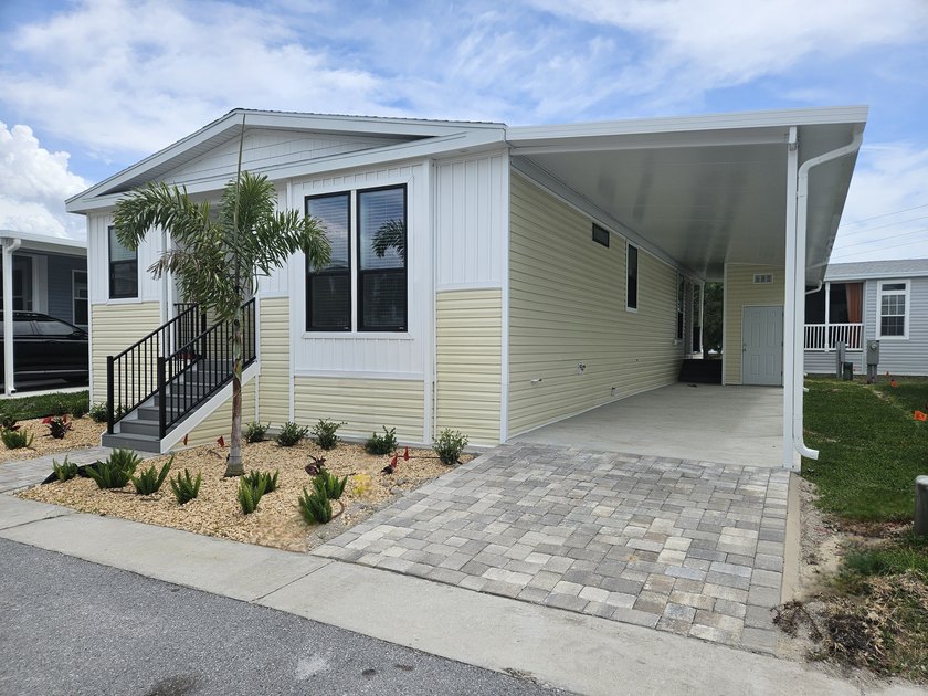 **UNDER CONSTRUCTION** BEAUTIFUL 2026 CHAMPION/SKYLINE SILVER - Beach Home for sale in Tarpon Springs, Florida on Beachhouse.com
