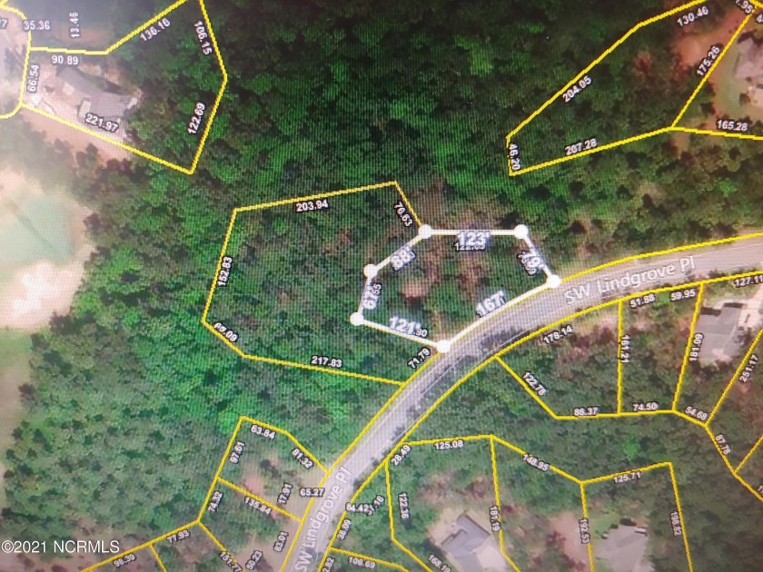 Huge .59/acre wooded home site on a beautiful street within the - Beach Lot for sale in Ocean Isle Beach, North Carolina on Beachhouse.com