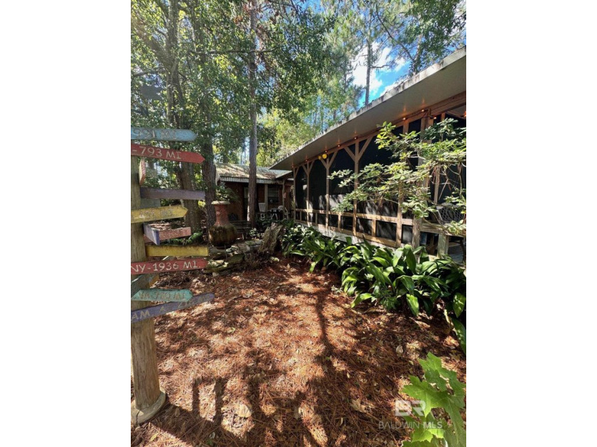 Discover a serene escape with this Coastal home nestled in a - Beach Home for sale in Lillian, Alabama on Beachhouse.com