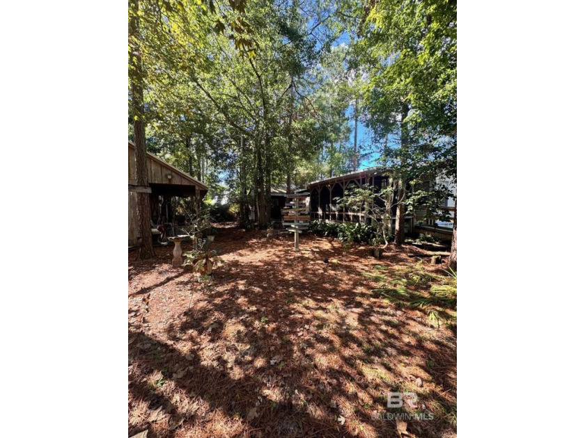 Discover the perfect retreat with this inviting RV lot nestled - Beach Lot for sale in Lillian, Alabama on Beachhouse.com