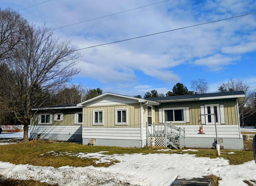 A MUST SEE AND A GREAT OPPORTUNITY!!! A charming home in the - Beach Home for sale in Tawas City, Michigan on Beachhouse.com