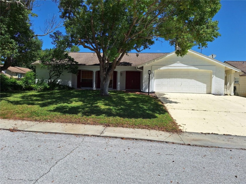 Desirable Beacon Woods Village!  Sitting high upon this corner - Beach Home for sale in Hudson, Florida on Beachhouse.com