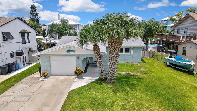 COMPLETELY REMODELED ALMOST EVERYTHING NEW: This Waterfront - Beach Home for sale in Hudson, Florida on Beachhouse.com