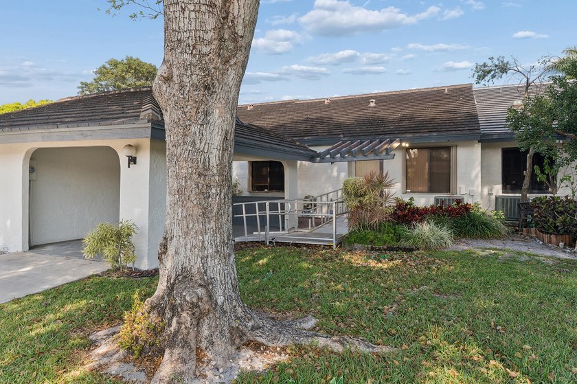 Nestled in the desirable Patio Villas section of Banyan Springs - Beach Home for sale in Boynton Beach, Florida on Beachhouse.com