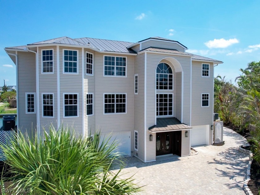 This stunning custom-built home, on a private cul-de-sac located - Beach Home for sale in Sanibel, Florida on Beachhouse.com