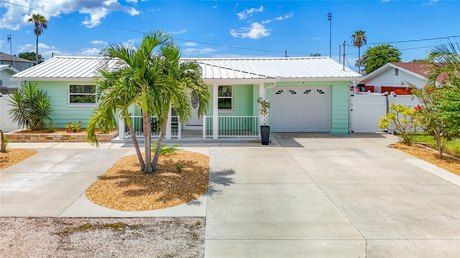 Waterfront living at its finest!  Welcome to a home that brings - Beach Home for sale in Hudson, Florida on Beachhouse.com