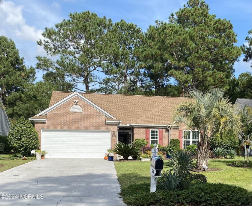 Exceptional Sandpiper Bay Golf Course living and the beauty of - Beach Home for sale in Sunset Beach, North Carolina on Beachhouse.com