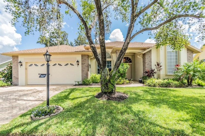 STUNNING 3 BEDROOM, 2.5 BATHROOM HOME WITH TONS OF UPGRADES IN - Beach Home for sale in New Port Richey, Florida on Beachhouse.com