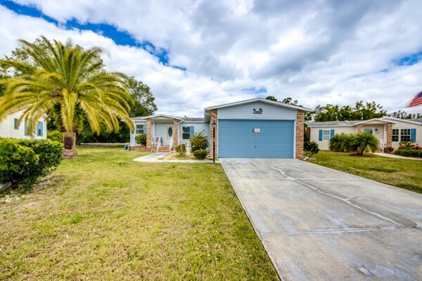 Embark on living in this updated home situated within a gated - Beach Home for sale in North Fort Myers, Florida on Beachhouse.com