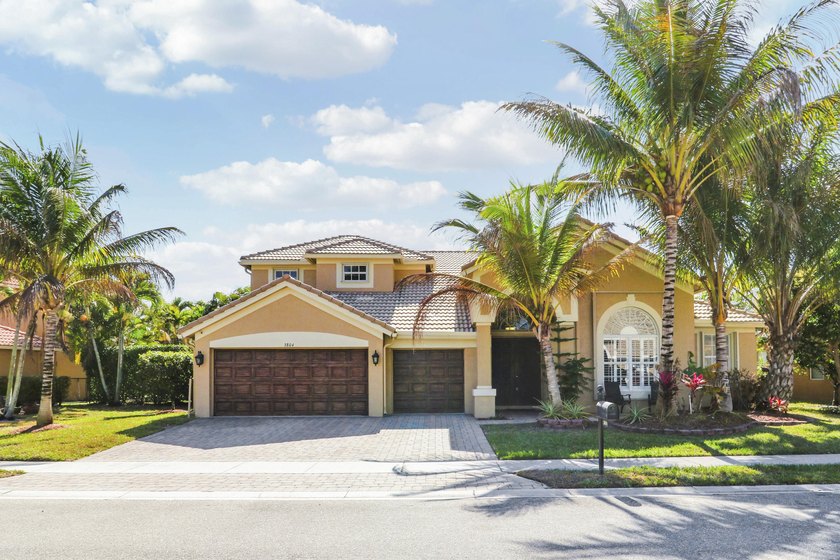 Beautiful Grande Home with 5 bedrooms, 4 baths, 3 car garage - Beach Home for sale in West Palm Beach, Florida on Beachhouse.com