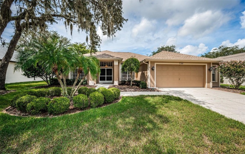 EXCITING NEWS - PRICE IMPROVEMENT FOR THIS EXTREMELY WELL - Beach Home for sale in Trinity, Florida on Beachhouse.com