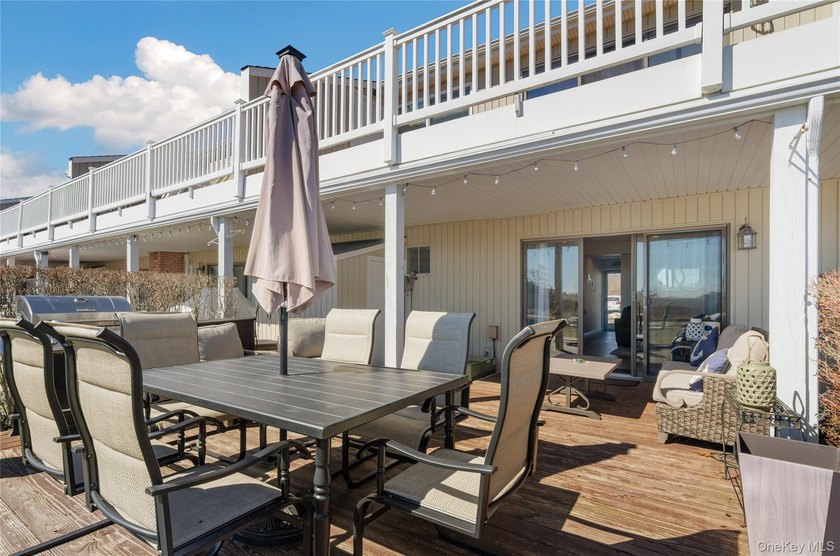 Experience the ultimate coastal lifestyle in this ground-level - Beach Home for sale in Hampton Bays, New York on Beachhouse.com