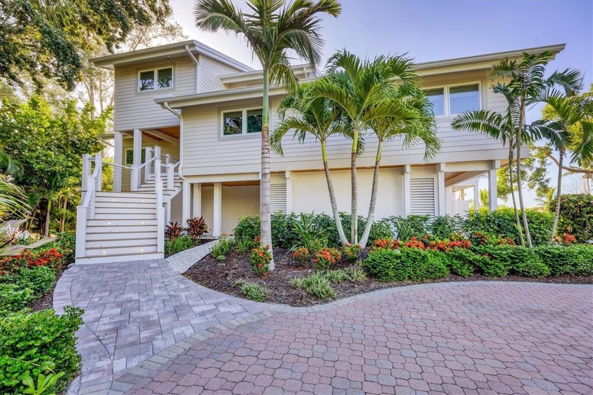 Experience coastal luxury at its finest in Siesta Key's - Beach Home for sale in Sarasota, Florida on Beachhouse.com