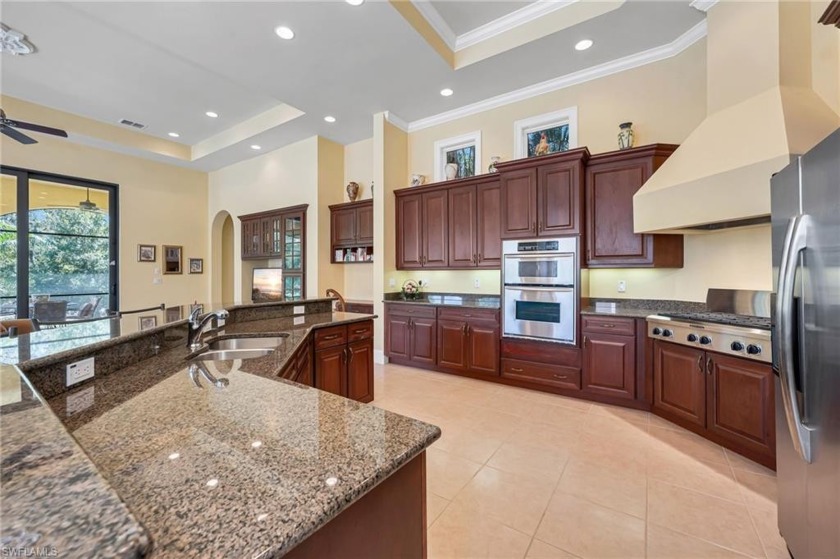 Experience the luxury of this custom-built home and enjoy the - Beach Home for sale in Bonita Springs, Florida on Beachhouse.com