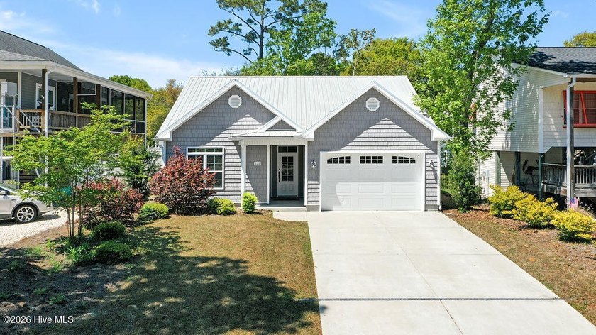 Welcome to a cozy take on modern beach living where style - Beach Home for sale in Oak Island, North Carolina on Beachhouse.com