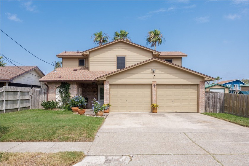 Welcome to 3346 Samoa Drive! This stunning waterfront home sits - Beach Home for sale in Corpus Christi, Texas on Beachhouse.com