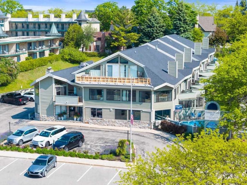 Located in the highly desirable Pointes North complex in - Beach Condo for sale in Charlevoix, Michigan on Beachhouse.com