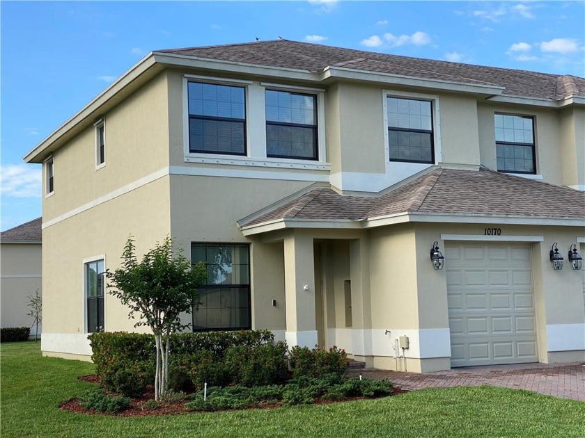 Beautiful corner Townhome with lovely partial views of the lake - Beach Home for sale in Vero Beach, Florida on Beachhouse.com