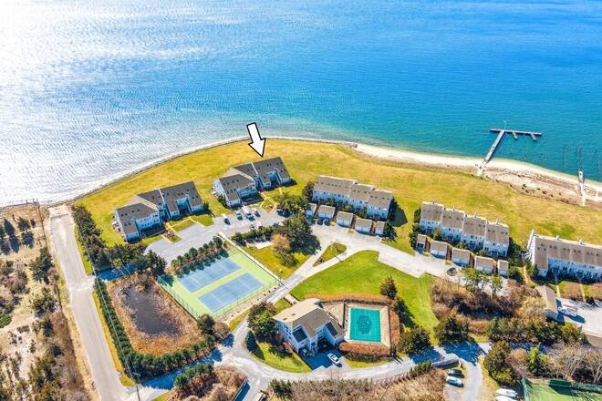 Indulge in the ultimate waterfront lifestyle at this beautiful - Beach Condo for sale in East Marion, New York on Beachhouse.com