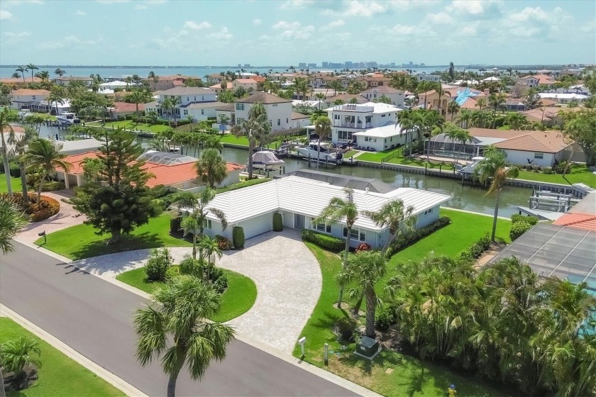 Welcome to your own piece of paradise in the prestigious Country - Beach Home for sale in Longboat Key, Florida on Beachhouse.com