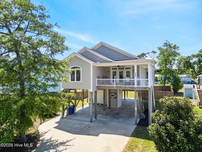 Coastal living at its best! This fully furnished and beautifully - Beach Home for sale in Oak Island, North Carolina on Beachhouse.com