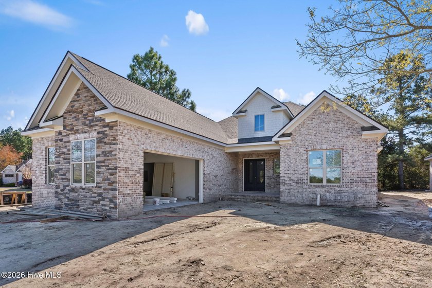 Located on a quiet cul-de-sac street within the Thistle Downs - Beach Home for sale in Sunset Beach, North Carolina on Beachhouse.com