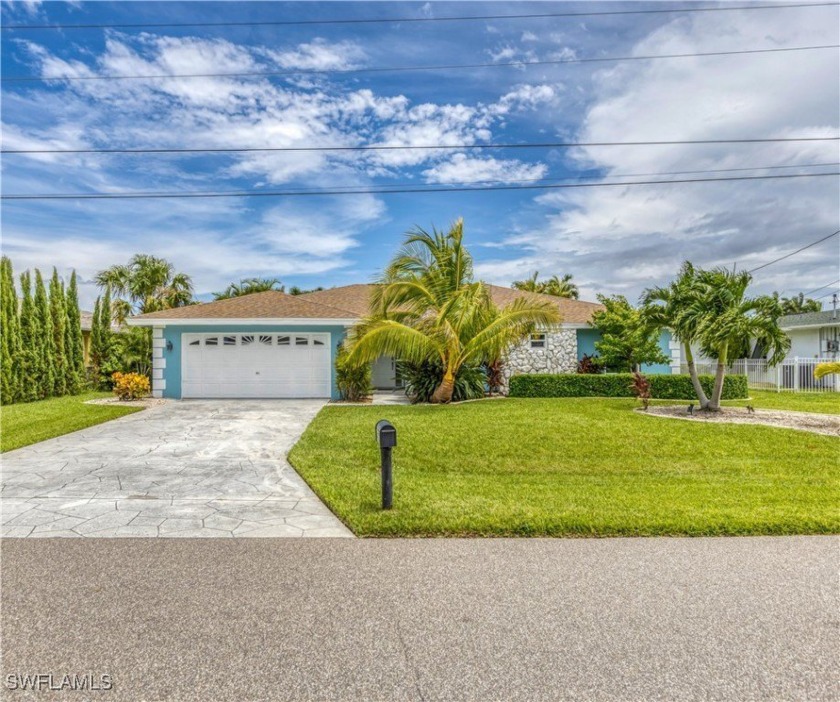 Welcome to this impeccably furnished 4-bedroom, 3-bathroom home - Beach Home for sale in Cape Coral, Florida on Beachhouse.com