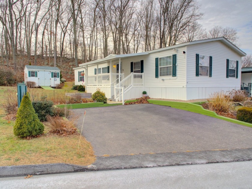 This charming double wide ranch-style home is located in - Beach Home for sale in Stonington, Connecticut on Beachhouse.com