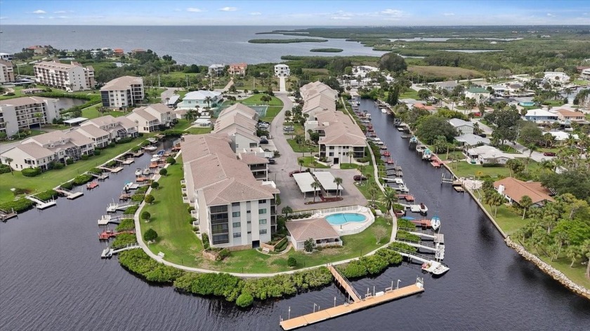 Welcome to the Gulf , Private dock is available with this - Beach Condo for sale in Port Richey, Florida on Beachhouse.com