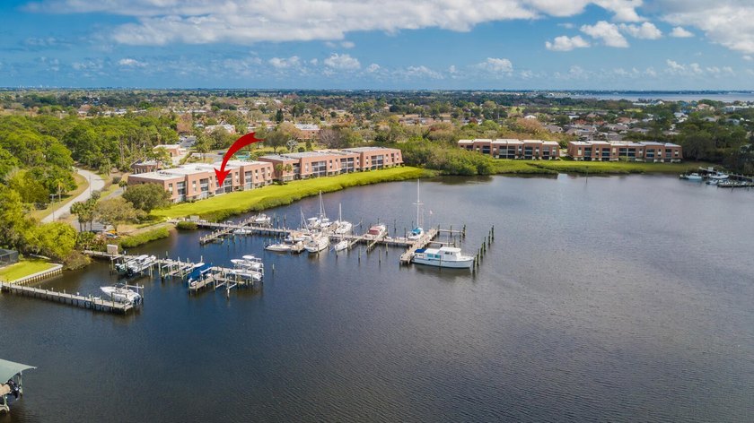 Experience waterfront living with wide views of Kitching Cove, a - Beach Condo for sale in Port Saint Lucie, Florida on Beachhouse.com