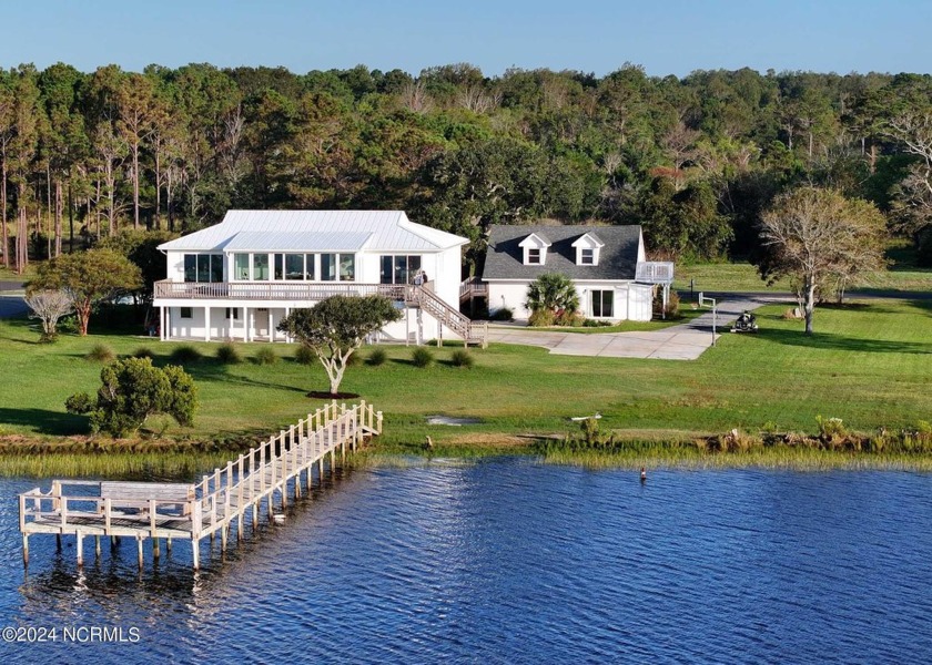 Set within a private gated community with an exclusive boat ramp - Beach Home for sale in Holly Ridge, North Carolina on Beachhouse.com