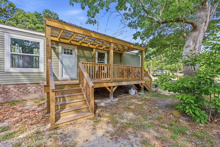 Tucked way just 4 miles from the shores of Holden Beach, this - Beach Home for sale in Supply, North Carolina on Beachhouse.com