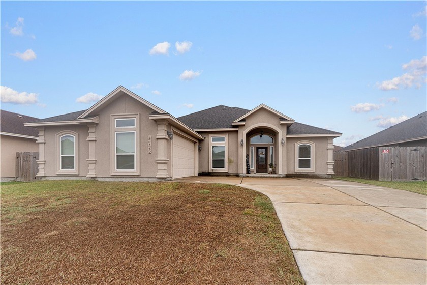 Welcome to this beautifully maintained custom home located in a - Beach Home for sale in Corpus Christi, Texas on Beachhouse.com