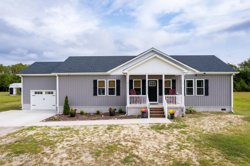 This beautifully maintained home feels like new construction - Beach Home for sale in Barco, North Carolina on Beachhouse.com