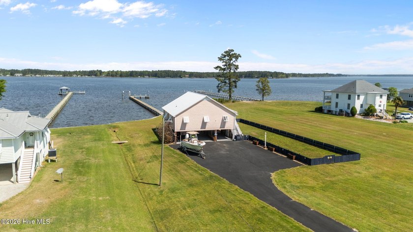Experience relaxed coastal living on the Bay River with this - Beach Home for sale in Merritt, North Carolina on Beachhouse.com