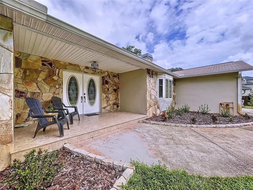 This 3-bedroom, 3-bathroom POOL home boasts a unique feature - a - Beach Home for sale in New Port Richey, Florida on Beachhouse.com