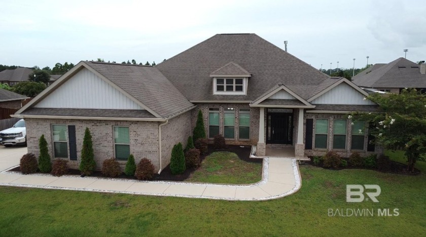 This beautiful home is situated in a highly sought-after - Beach Home for sale in Foley, Alabama on Beachhouse.com