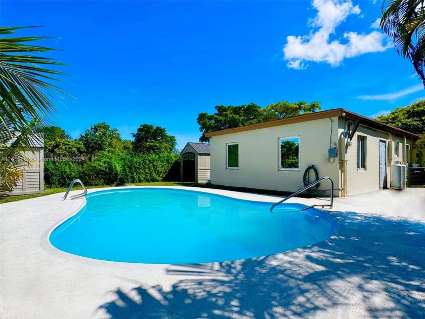 This charming and move-in-ready home offers 3 bedrooms and 1 - Beach Home for sale in North Miami Beach, Florida on Beachhouse.com