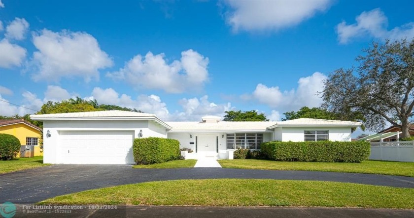 This warm and spacious 3BR 2BR home offers the perfect blend of - Beach Home for sale in Hollywood, Florida on Beachhouse.com