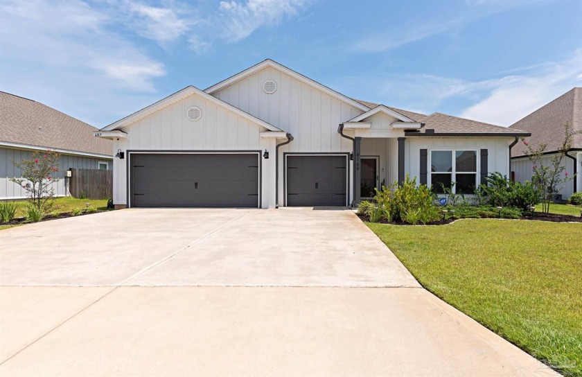 Experience modern comfort and timeless style in this immaculate - Beach Home for sale in Gulf Breeze, Florida on Beachhouse.com