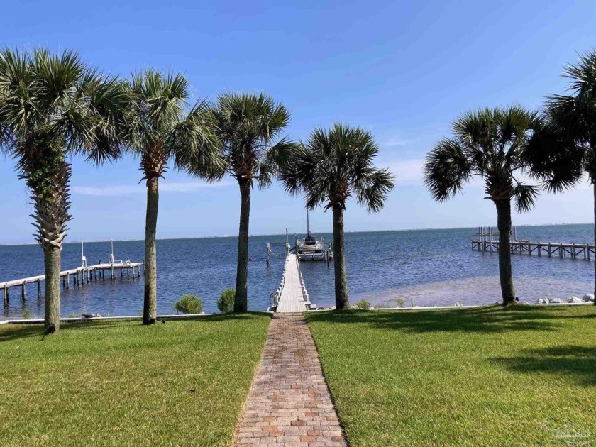 UNOBSTRUCTED WATER VIEWS and PIER with Water & Electricity, BOAT - Beach Home for sale in Navarre, Florida on Beachhouse.com