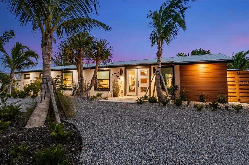 Chic Art Deco Canalfront Retreat!  Escape to paradise in this - Beach Home for sale in Holmes Beach, Florida on Beachhouse.com